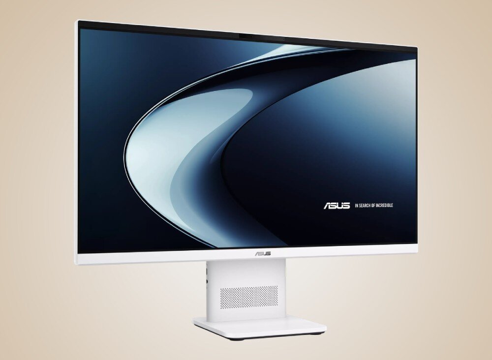 Komputer All in One z dużym ekranem, na którym widoczna jest grafika z logo \'ASUS In Search of Incredible\'. Urządzenie ma biały stojak z perforacją na podstawie.