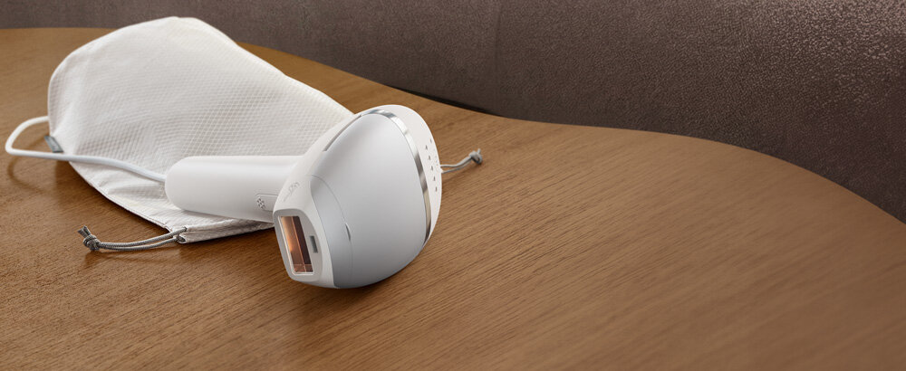 Depilator Philips Lumea i etui do przechowywania.