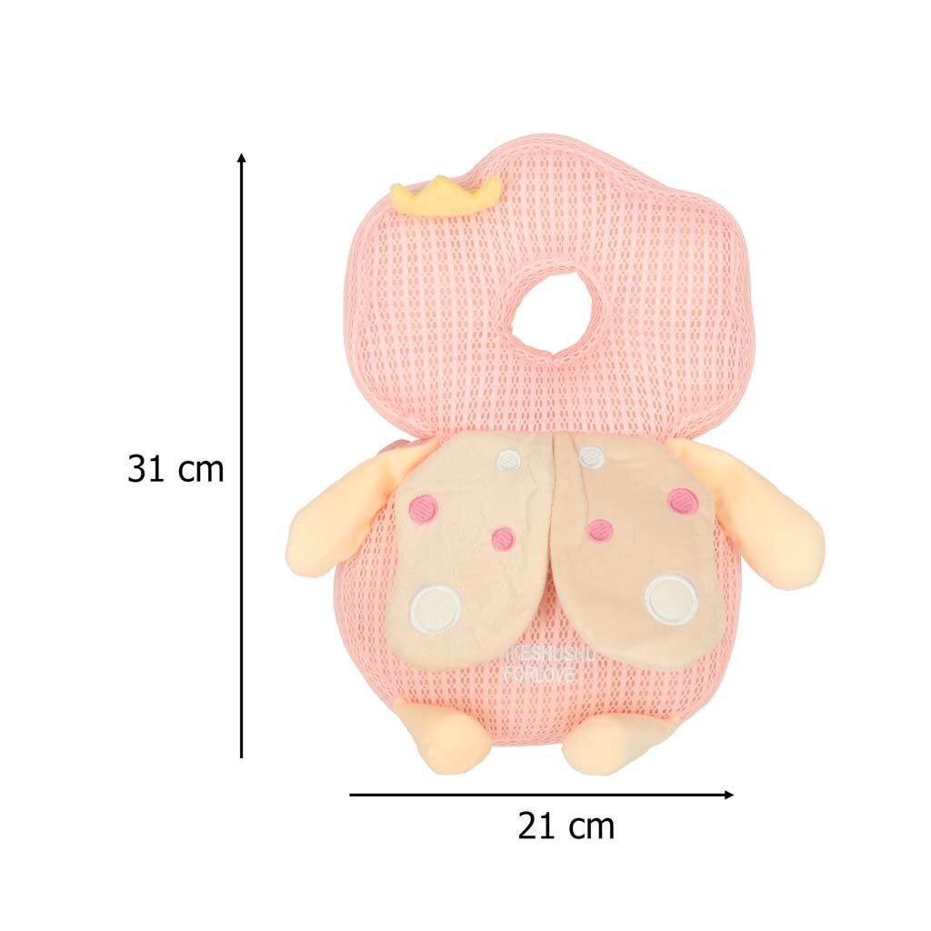 Różowa poduszka ochronna dla dziecka z otworem na środku, ozdobiona małą koroną i skrzydełkami. Wymiary poduszki to 31 cm wysokości i 21 cm szerokości.