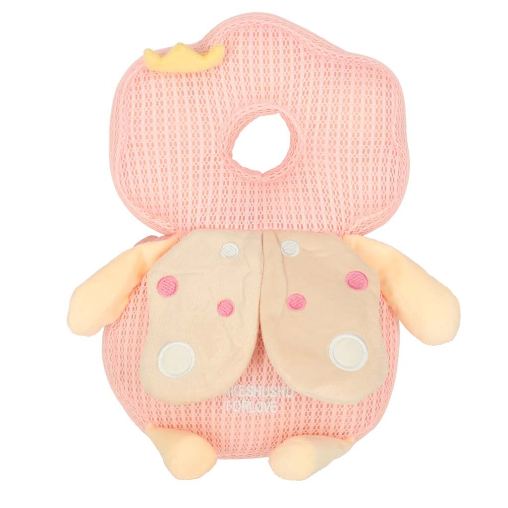 Różowa poduszka w kształcie wróżki z otworem na środku i małymi skrzydłami ozdobionymi kropkami. Na poduszce widoczny jest napis \'CUSHION FOR LOVE\'.