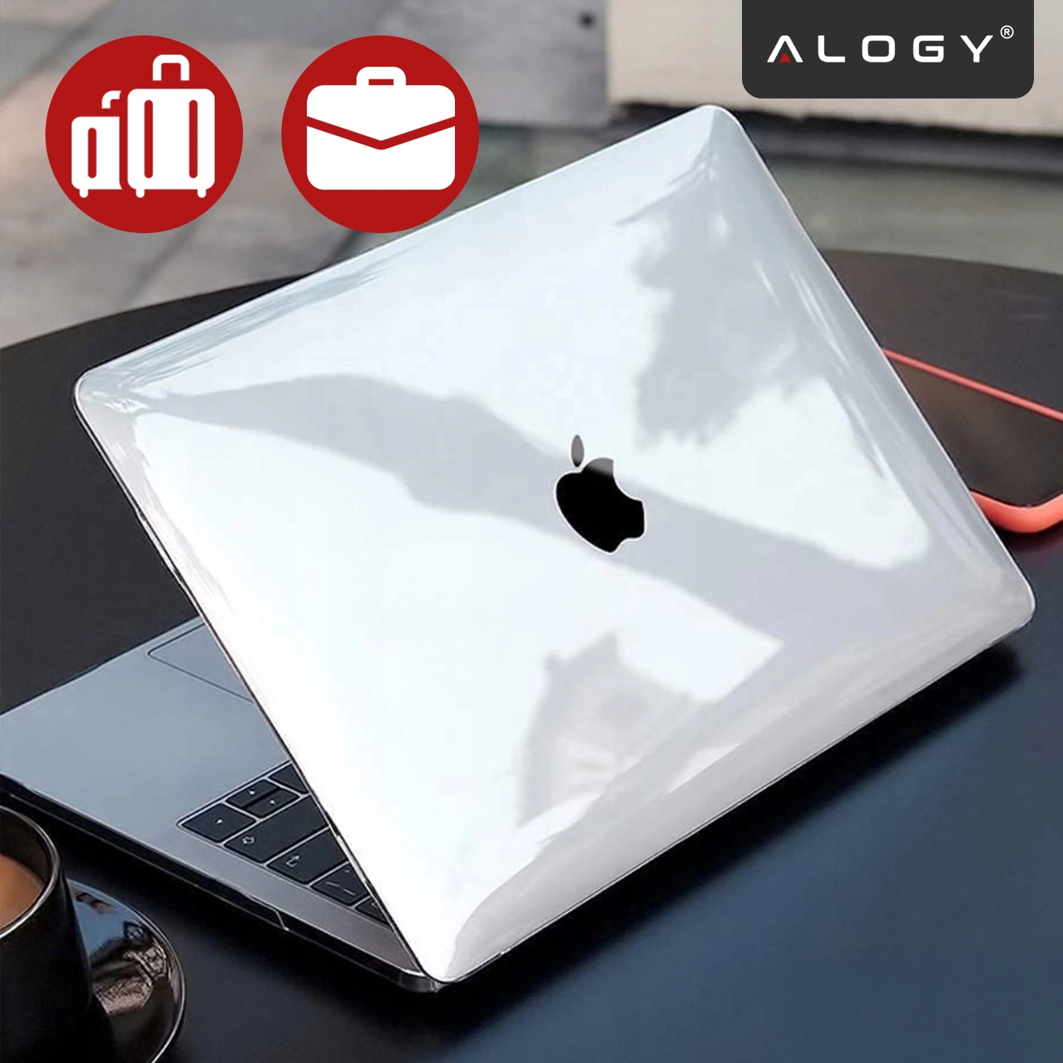 Na obrazie widoczny jest laptop z przezroczystym etui, na którym znajduje się logo w kształcie jabłka. W prawym górnym rogu widnieje logo \'ALOGY\'.