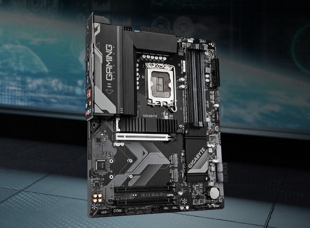 Komputer MAD DOG VENTUM400ARGB-I02WR32WH Płyta główna do komputera stacjonarnego z gniazdem procesora, radiatoami, bankami pamięci i napisem 'GAMING SERIES'
