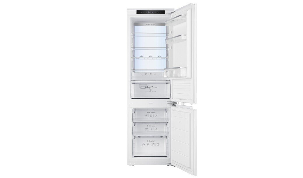 Otwarta lodówka z widocznymi półkami, szufladami i miejscem na butelki. Na szufladach widoczny jest tekst: \'Vit Control Plus\' i \'No Frost\'.