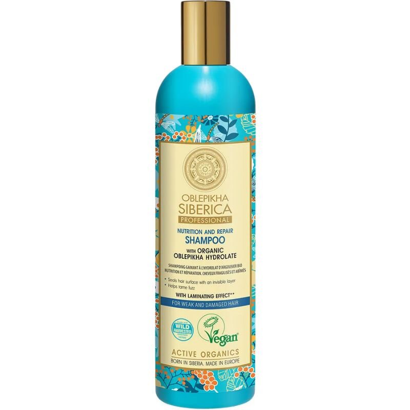 Butelka szamponu Oblepikha Siberica Professional z turkusową etykietą ozdobioną motywem roślinnym i złotym korkiem. Na etykiecie widnieje tekst: \'OBLEPIKHA SIBERICA PROFESSIONAL NUTRITION AND REPAIR SHAMPOO WITH ORGANIC OBLEPIKHA HYDROLATE\'.