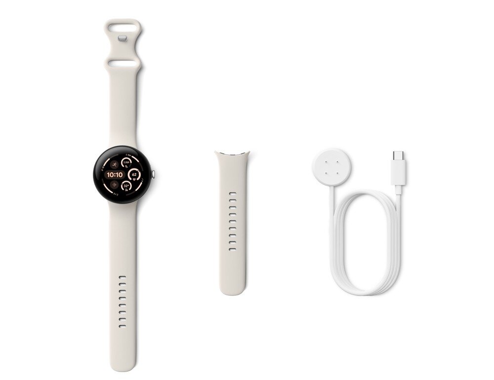 Na obrazie widoczny jest smartwatch z okrągłym wyświetlaczem, dodatkowy pasek oraz biały kabel z ładowarką indukcyjną. Wyświetlacz zegarka pokazuje godzinę 10:10 oraz kilka ikon aplikacji.