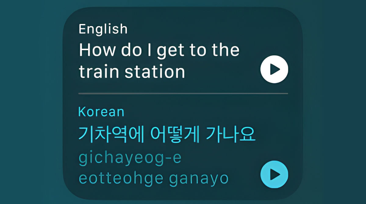 Na ekranie widoczny jest tekst w języku angielskim: \'How do I get to the train station\' oraz w języku koreańskim: \'기차역에 어떻게 가나요\'. Obok każdego tekstu znajduje się przycisk odtwarzania.