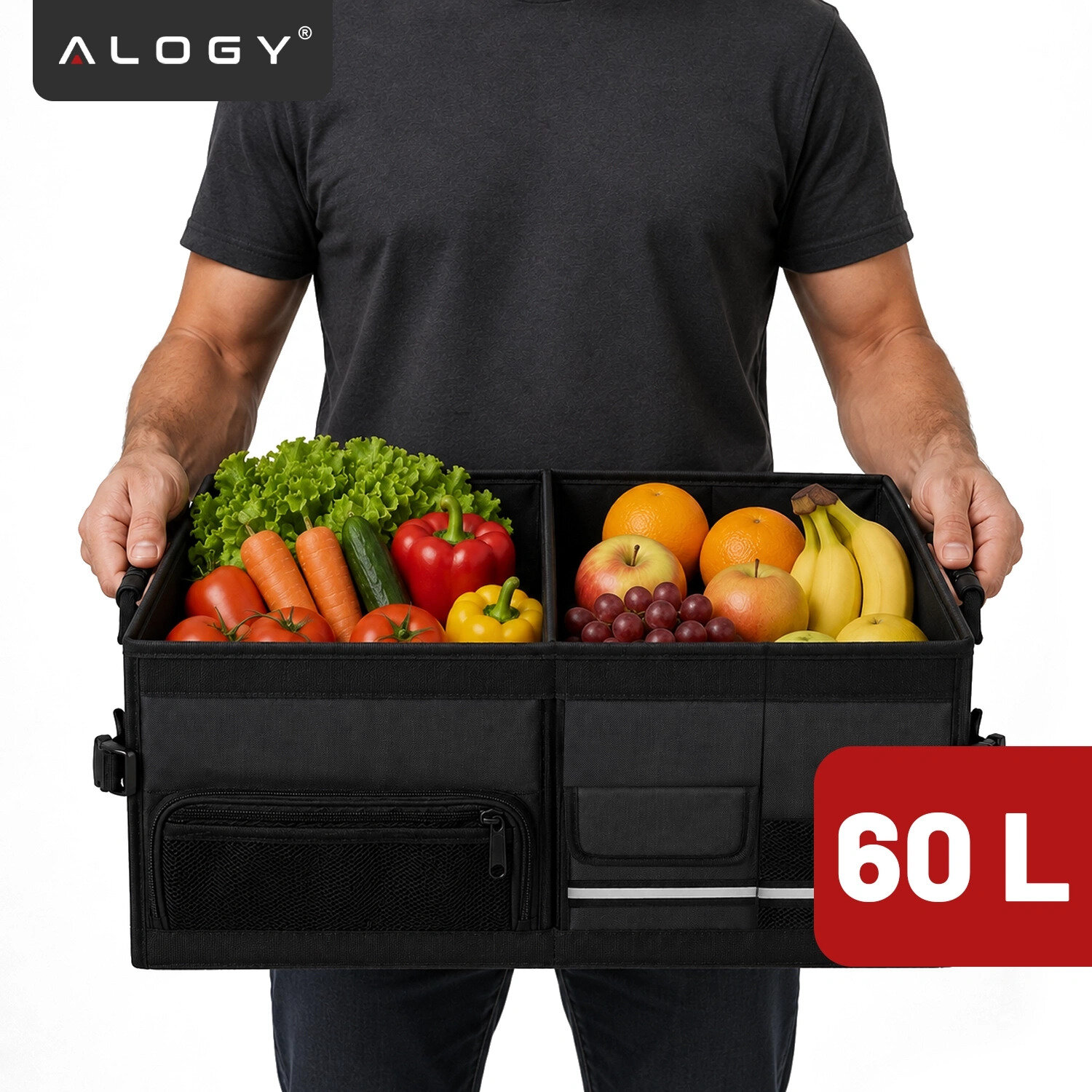 Osoba trzyma czarny organizer do bagażnika z logo \'ALOGY\', wypełniony owocami i warzywami. Na obrazie widoczny jest napis \'60 L\'.