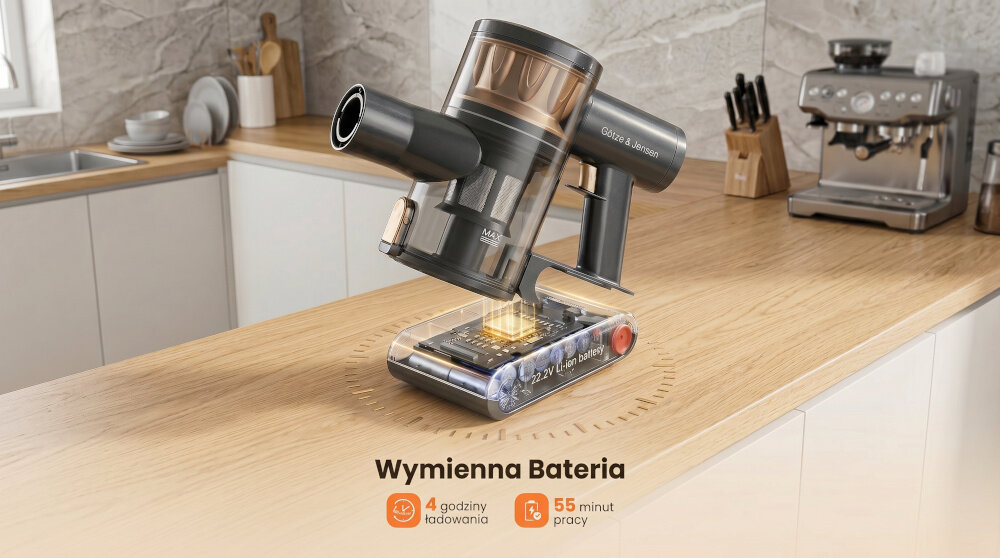 Odkurzacz GÖTZE & JENSEN VV300 z wymienną baterią znajduje się na blacie kuchennym. Na dole widoczny jest tekst: \'Wymienna Bateria\', \'4 godziny ładowania\', \'55 minut pracy\'.