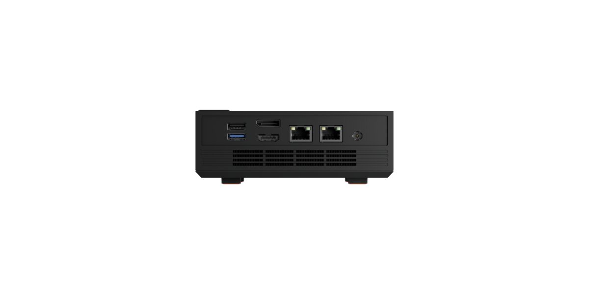 Czarny mini PC z widocznymi portami: USB, HDMI, Ethernet i zasilania na tylnej ściance.