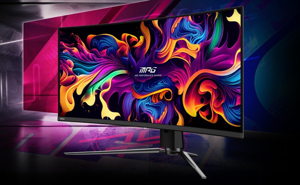 Monitor z zakrzywionym ekranem wyświetla kolorową grafikę z abstrakcyjnymi wzorami. Na ekranie widoczny jest napis \'MPG PERFORMANCE GAMING\'.