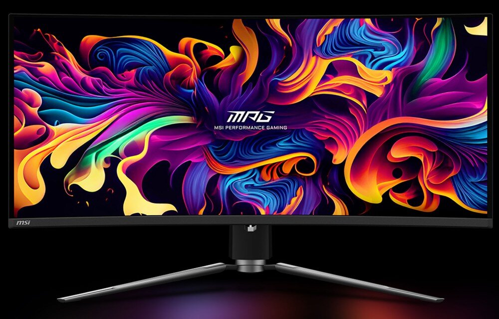 Monitor z zakrzywionym ekranem wyświetla kolorową, abstrakcyjną grafikę. Na ekranie widoczny jest tekst: \'MPG MSI PERFORMANCE GAMING\'.