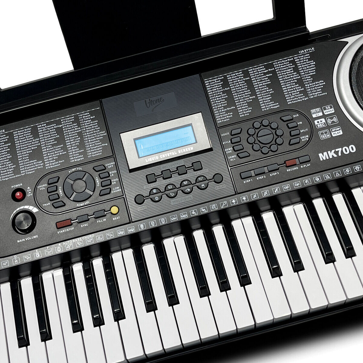 Keyboard z 61 klawiszami, wyświetlaczem LCD i różnymi przyciskami funkcyjnymi. Widoczne są napisy \'MK700\' oraz \'Liquid Crystal Screen\'.