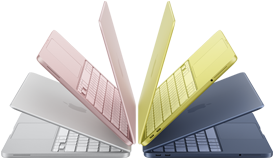 Cztery laptopy w różnych kolorach: różowym, żółtym, niebieskim i srebrnym, ustawione w formie wachlarza. Każdy laptop ma widoczną klawiaturę i ekran.