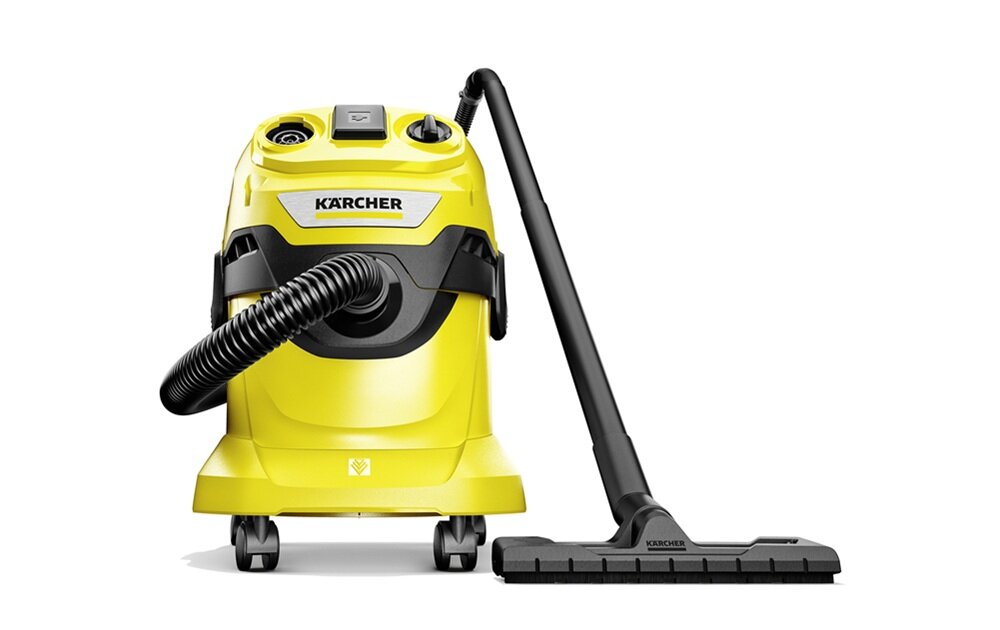 Żółty odkurzacz z czarnymi elementami i logo \'KARCHER\' na przodzie. Odkurzacz posiada wąż ssący i szeroką końcówkę do podłóg.