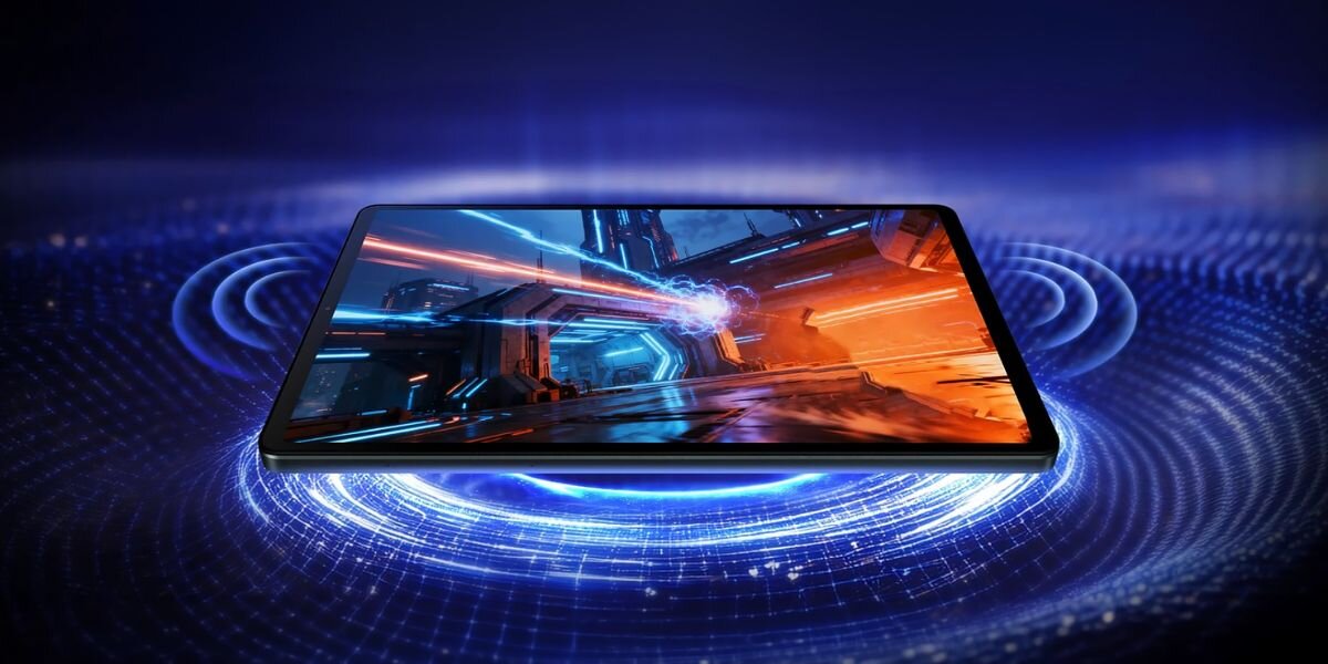 Tablet z wyświetlaczem prezentującym dynamiczną grafikę w futurystycznym stylu, otoczony niebieskimi, świetlnymi kręgami.