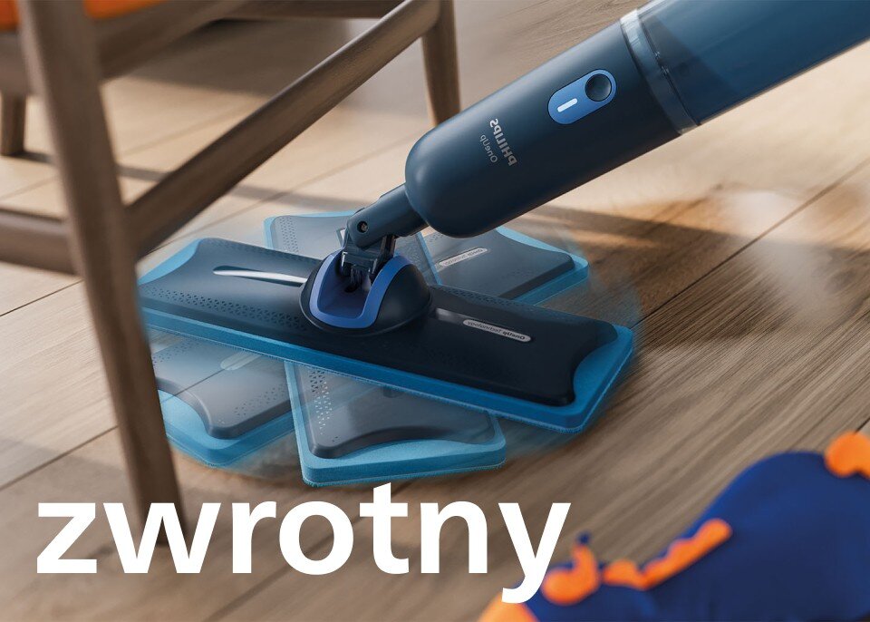 Na obrazie widoczny jest elektryczny mop marki PHILIPS z napisem \'zwrotny\'. Mop znajduje się na drewnianej podłodze obok mebla.