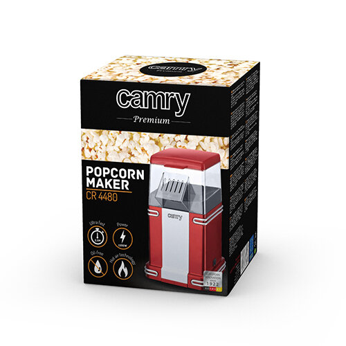 Opakowanie maszyny do popcornu CAMRY CR 4480 z widocznym zdjęciem urządzenia w kolorze czerwonym i białym. Na opakowaniu znajdują się napisy: \'camry Premium\', \'POPCORN MAKER CR 4480\', oraz ikony przedstawiające funkcje urządzenia.