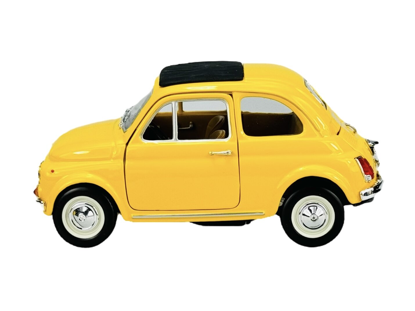 Żółty model samochodu w skali 1:24, przedstawiający klasyczny pojazd z czarnym dachem i srebrnymi detalami. Samochód ma białe opony z chromowanymi kołpakami.