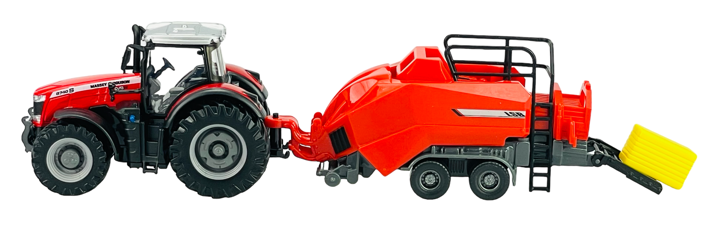 Model traktora w czerwonym kolorze z przyczepioną belownicą, która jest również czerwona z żółtym elementem na końcu. Na traktorze widoczny jest napis \'Massey Ferguson 8740S\'.