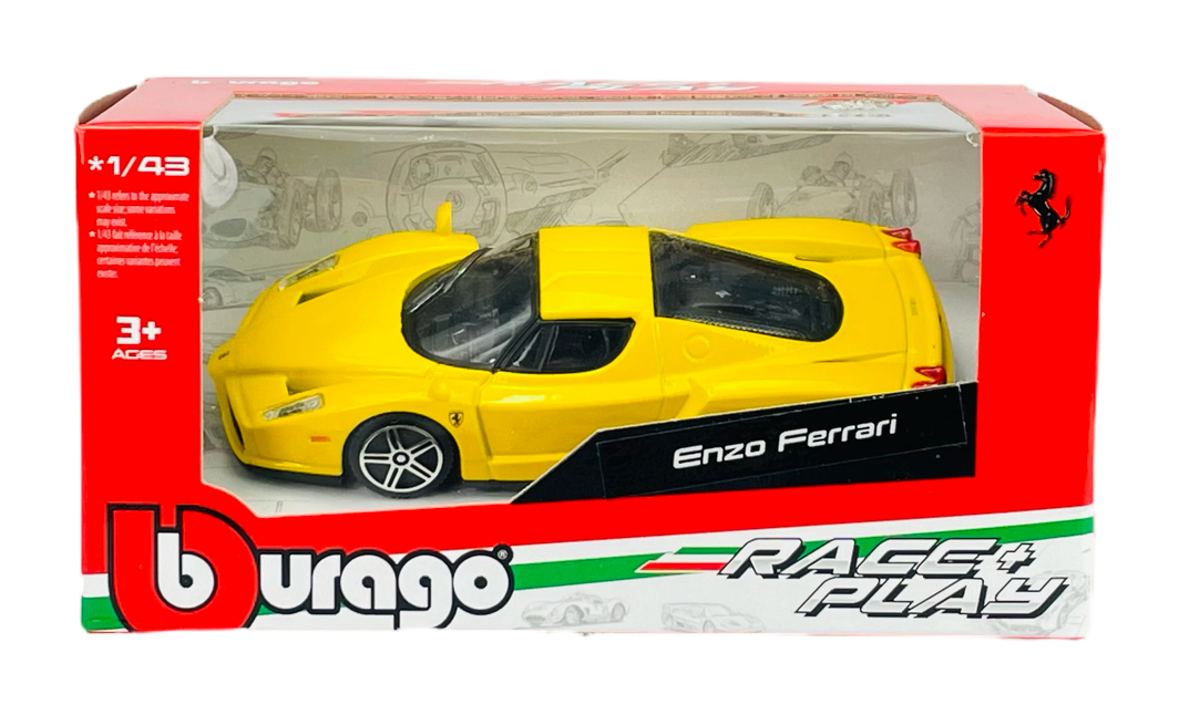 Żółty model samochodu Enzo Ferrari w skali 1:43 znajduje się w opakowaniu z przezroczystym frontem. Na opakowaniu widoczne są napisy: \'Bburago\', \'Race & Play\' oraz \'Enzo Ferrari\'.
