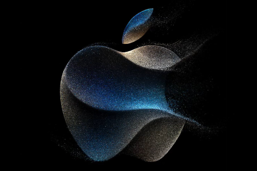 Logo Apple w formie abstrakcyjnej, z efektem rozmycia i kolorami niebieskim oraz beżowym na czarnym tle.