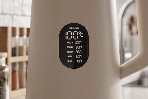 Na obrazie widoczny jest wyświetlacz czajnika z temperaturami dla różnych rodzajów herbat: wrzątek 100°C, czarna 90°C, zielona 85°C, woda 60°C, mleko 40°C.