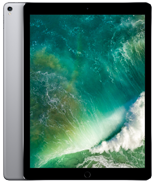 Tablet z dużym ekranem wyświetlającym obraz z falą morską. Obudowa urządzenia jest w kolorze srebrnym.