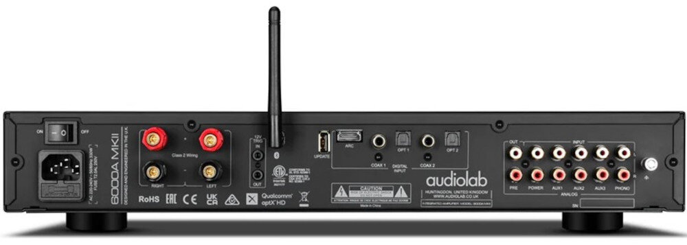 Tył wzmacniacza zintegrowanego z różnymi złączami, w tym HDMI, USB, optycznymi i analogowymi. Widoczne logo \'audiolab\' oraz oznaczenia modelu \'6000A MKII\'.