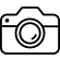 Ikona przedstawia czarny symbol aparatu fotograficznego na białym tle.