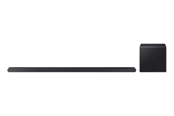 Na obrazie widoczny jest czarny soundbar oraz bezprzewodowy subwoofer. Oba elementy są proste i nowoczesne w designie.