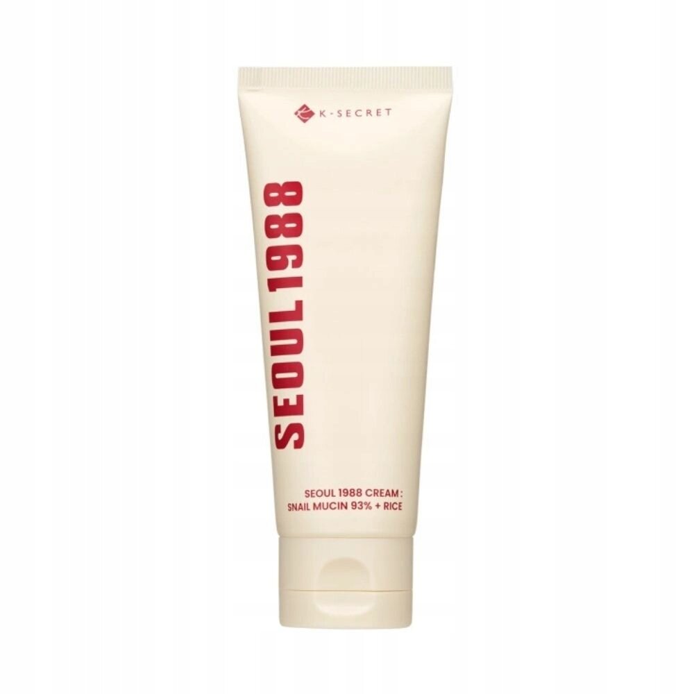 Na obrazie widoczna jest tubka kremu z napisem \'SEOUL 1988\' oraz logo \'K-SECRET\'. Na dole tubki znajduje się tekst: \'SEOUL 1988 CREAM: SNAIL MUCIN 93% + RICE\'.