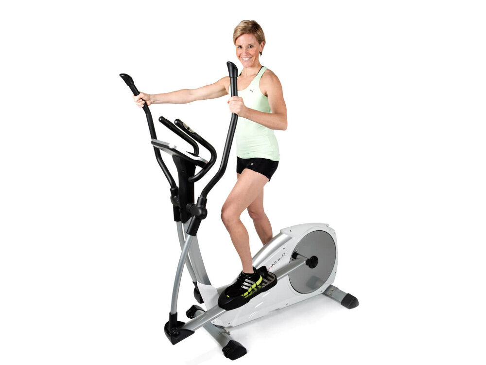Orbitrek elektromagnetyczny FINNLO Loxon XTR 20kg 42cm osoba ćwiczy na sprzęcie poprawa kondycji redukcja tkanki tłuszczowej trening w domu zdrowie