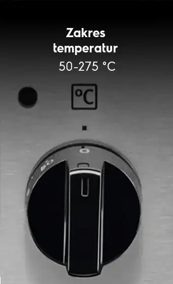 Obraz przedstawia pokrętło z oznaczeniem temperatury na kuchence, z zakresem temperatur 50-275 °C. Nad pokrętłem widoczny jest napis \'Zakres temperatur\'.