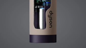 Поперечний розріз яскраво-рожевого корпусу зубної щітки Dyson показує батарею.