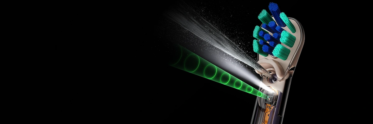 Zielono-niebieska końcówka Dyson Regular z włączoną funkcją irygacji i kamerą