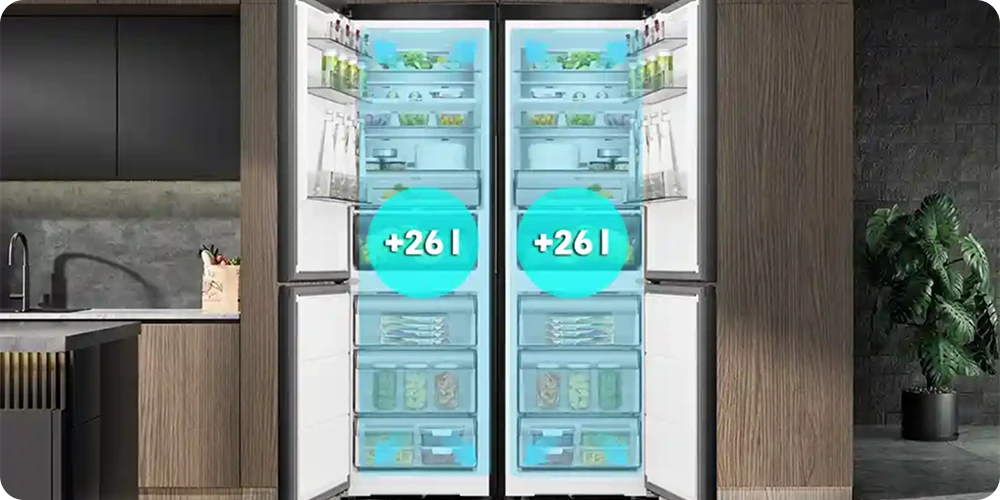 Obraz przedstawia otwartą lodówkę z dwoma komorami, wypełnioną różnymi produktami spożywczymi. Na drzwiach lodówki widoczne są napisy \'+261 l\'.