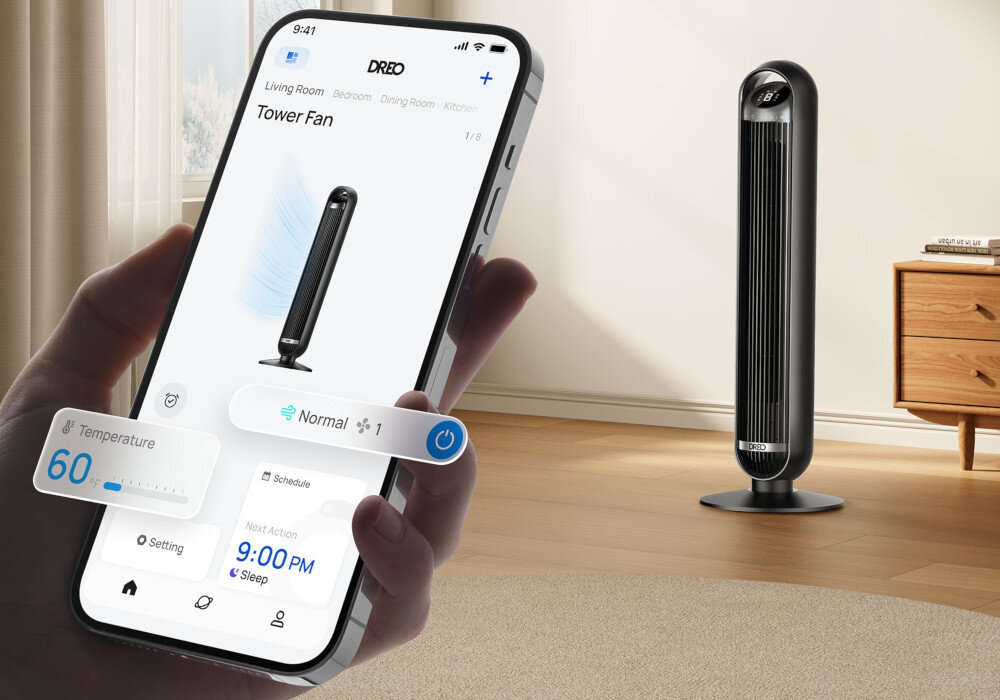 Osoba trzyma smartfon z aplikacją pokazującą ustawienia wentylatora, w tle stoi czarny wentylator kolumnowy. Na ekranie telefonu widoczny jest tekst: \'DREO\', \'Tower Fan\', \'Normal\', \'Temperature 60\', \'9:00 PM\'.