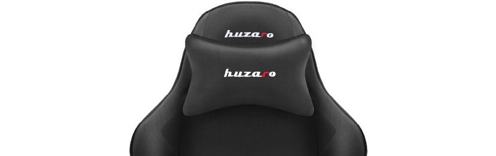 Czarny fotel gamingowy z widocznym logo \'huzaro\' na zagłówku i poduszce lędźwiowej.