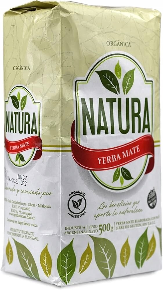 Opakowanie Yerba Mate Natura ORGANICA 500g z Argentyny, z widocznym logo \'NATURA\' i napisem \'YERBA MATE\'. Opakowanie jest ozdobione zielonymi liśćmi i posiada informacje o produkcie oraz certyfikaty organiczne.