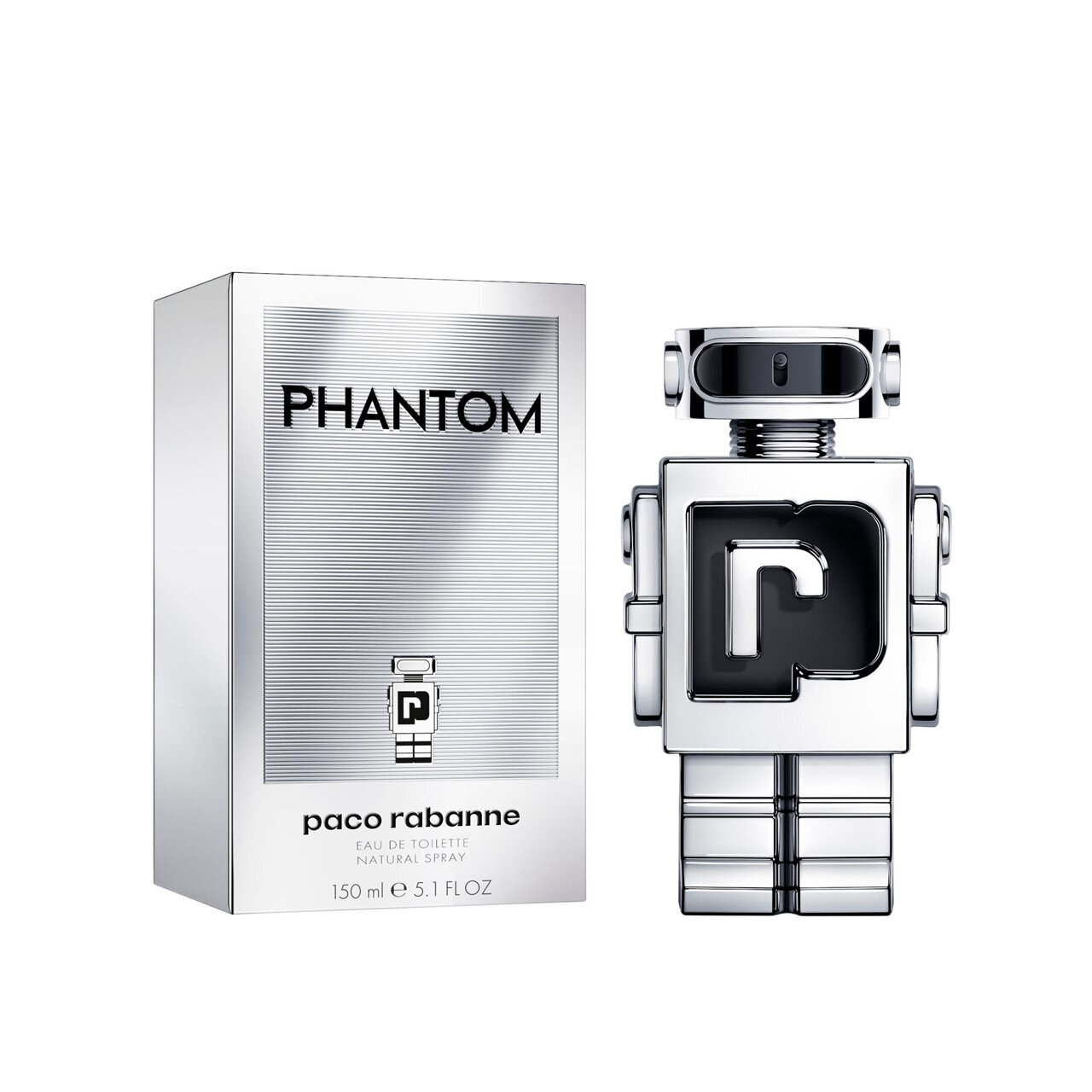 Na obrazie widoczna jest srebrna butelka w kształcie robota oraz opakowanie z napisem \'PHANTOM\'. Na opakowaniu znajduje się również tekst \'paco rabanne EAU DE TOILETTE NATURAL SPRAY 150 ML e 5.1 FL OZ\'.