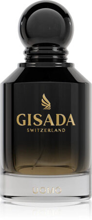 Butelka perfum o ciemnym, gradientowym kolorze z napisem \'GISADA SWITZERLAND\' oraz \'UOMO\' na dole. Na górze znajduje się okrągły korek.