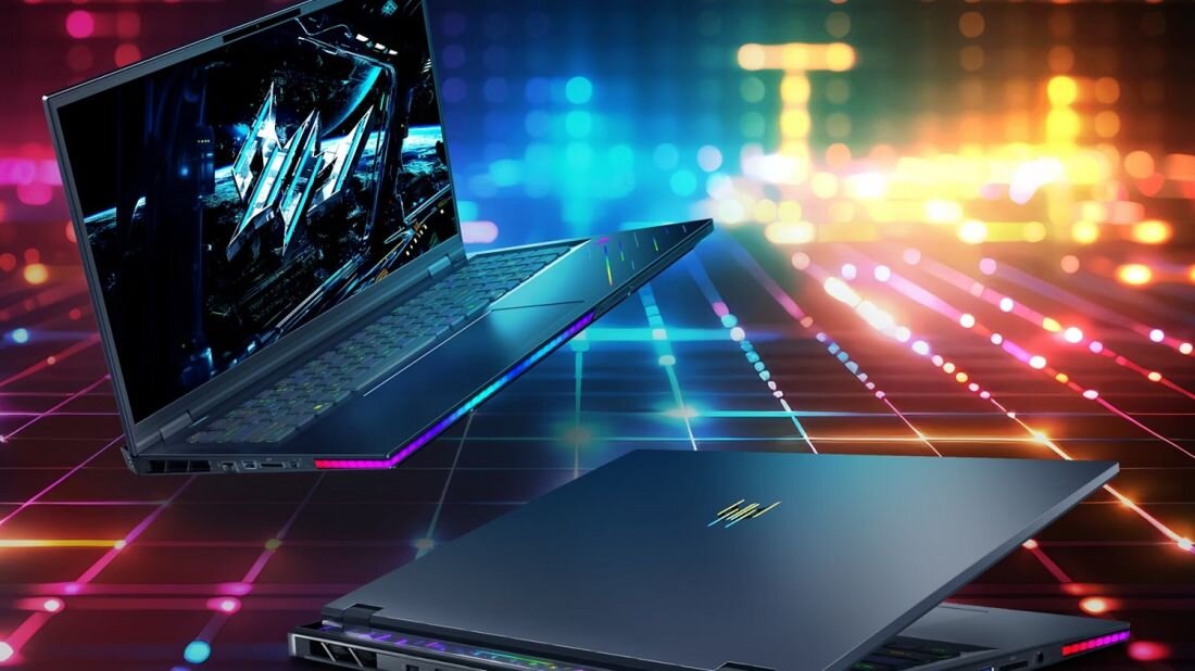 Dwa laptopy z widocznym logo producenta na obudowie, umieszczone na tle kolorowych, neonowych świateł. Ekran jednego z laptopów wyświetla futurystyczną grafikę.