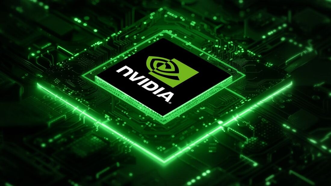 Obraz przedstawia zielony układ scalony z logo \'nvidia\' na środku. Układ jest otoczony świecącymi zielonymi liniami na tle przypominającym płytę główną.
