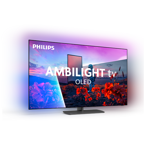 Telewizor z wyświetlaczem OLED prezentuje kolorowy krajobraz z kwiatami i niebem o zachodzie słońca. Na ekranie widoczny jest tekst: \'PHILIPS AMBILIGHT tv OLED\'.