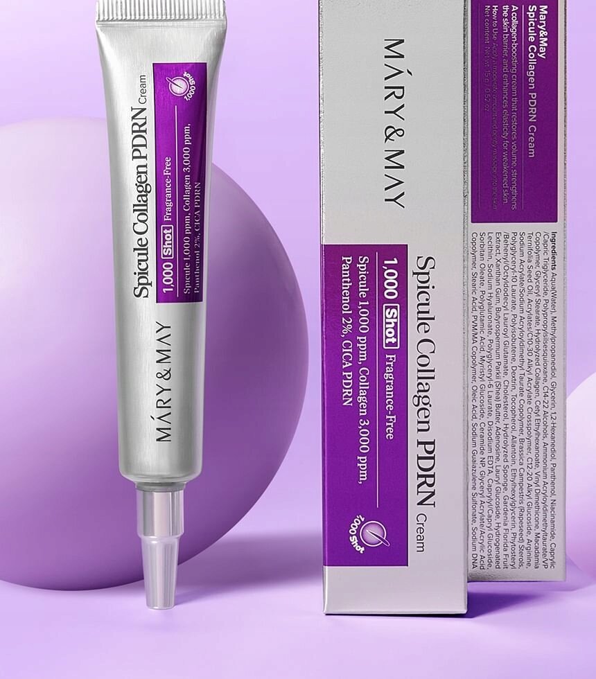 Na obrazie widoczna jest tubka kremu do twarzy oraz opakowanie z napisem \'MARY & MAY Spicule Collagen PDRN Cream\'. Tło jest w odcieniach fioletu, a na opakowaniu znajdują się dodatkowe informacje o produkcie.