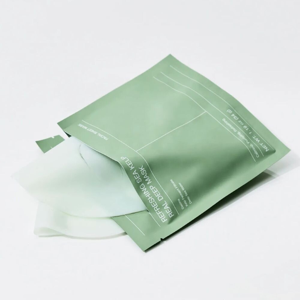 Zielone opakowanie maseczki hydrożelowej z widocznym tekstem \'REFRESHING SEA KELP REAL DEEP MASK\'.