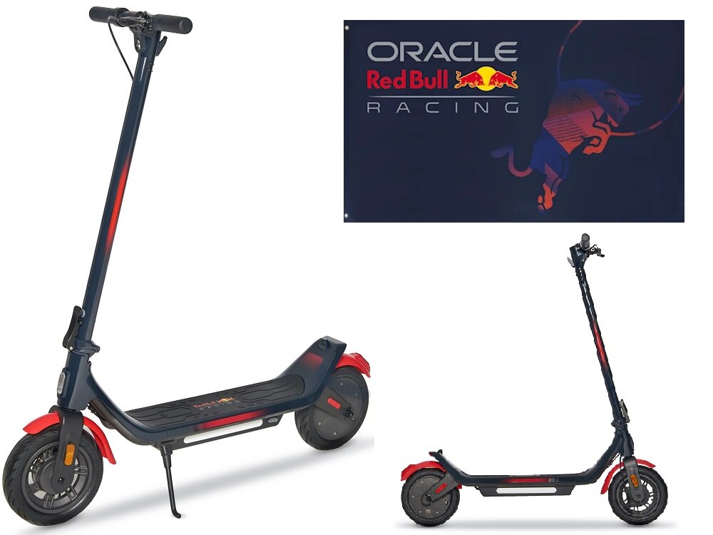 Na obrazie widoczna jest granatowo-czerwona hulajnoga elektryczna z logo Red Bull. Obok znajduje się baner z napisem \'ORACLE Red Bull RACING\'.