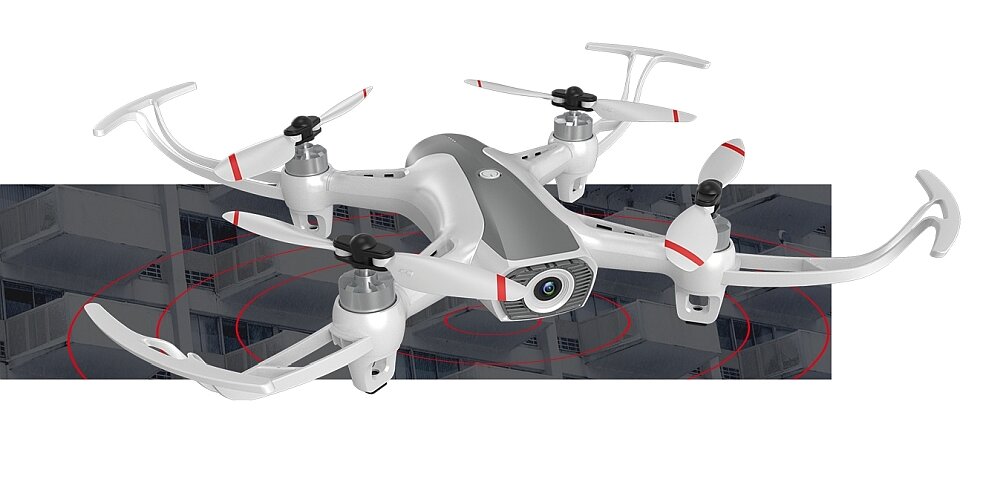 Biały dron z czterema śmigłami i kamerą na przodzie, na tle szarego wzoru z czerwonymi okręgami.