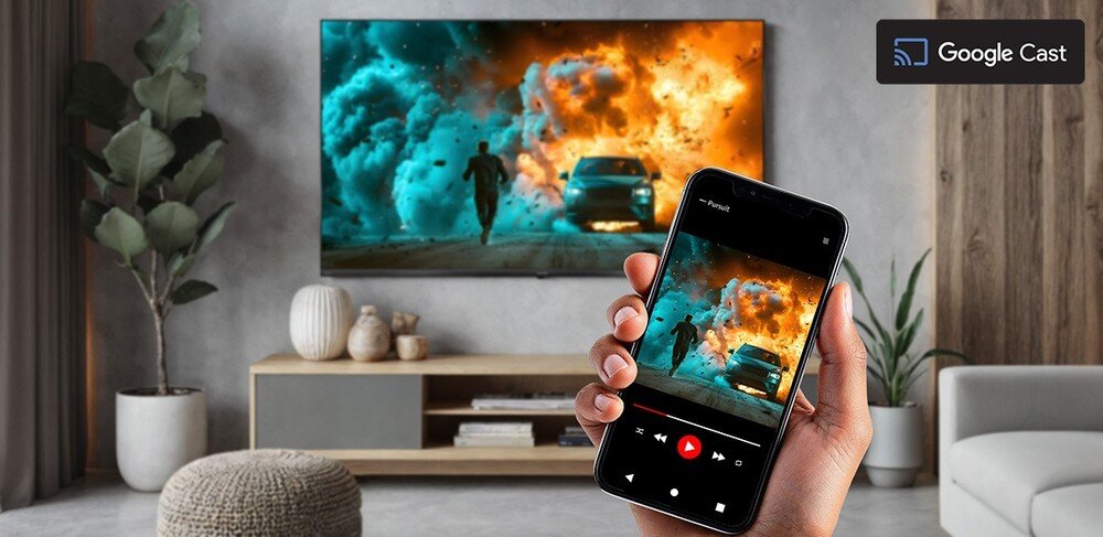 Telewizor SHARP 55JT8765E z Google Cast, bezprzewodowe przesyłanie filmów i seriali ze smartfona, tabletu lub komputera przez Wi-Fi, telewizor zawieszony na ścianie w pomieszczeniu