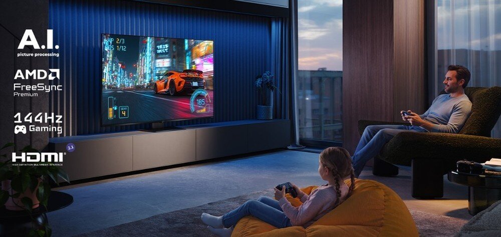 Telewizor SHARP 65JR7765E, gaming, FreeSync Premium, HDMI 2.1, VRR, ALLM, input lag około 10 ms i gry w chmurze Boosteroid, telewizor stojący na komodzie w pomieszczeniu